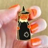 The Stitched Witch Enamel Pin -Erstwilder ap1ep06thestitchedwitchenamelpin handheld