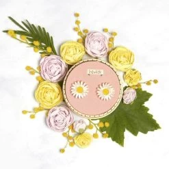 She Loves Me Daisy Earrings -Erstwilder erstwilder daisy earrings yellow flatlay