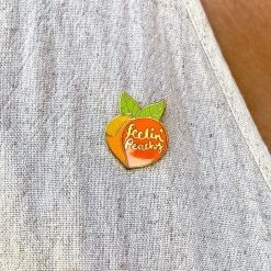 Feelin' Peachy Enamel Pin -Erstwilder erstwilder feelin peachy peach enamel pin model orange 29ac0998 bda4 447e 884c 8a62cf8a9e4b